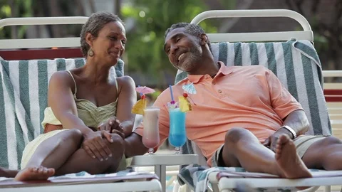 Middle-aged couple talking and smiling. 스톡 동영상 88368211