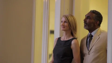 Middle-aged couple talking by a window. Stock-Footage 88369891