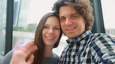 Middle aged couple tourists calling video chat smiling travelling in river tram. Vídeo Stock 309683571