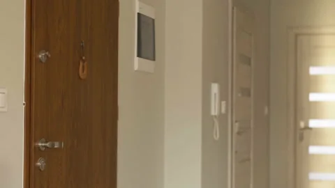 Middle aged couple visiting their granddaughter, grandchild greeting her Stock Footage 129541759