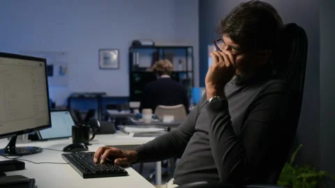 Middle Aged Cybersecurity Analyst Suffering Burnout at Office Desk Stock Footage 347290909