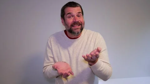 Middle Aged Dad Demonstrating 6-7 Gestures Stock Footage 320176486