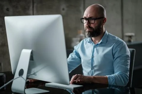 Middle-aged designer working in office イラスト素材