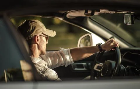 Middle Aged Driver Inside His Convertible Vehicle Stock Photos