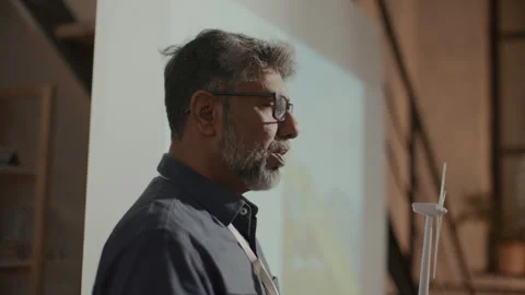 Middle-Aged Engineer Giving Presentation at Renewable Energy Seminar Stock Footage 300227798