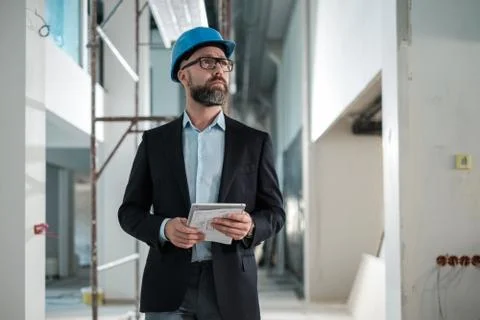 Middle-aged engineer in hardhat Stock Photos
