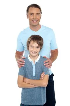 Middle aged father posing with his smart son Stock Photos