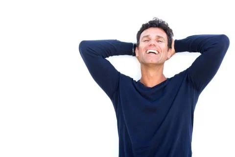 Middle aged guy laughing with hands behind head Stock Photos