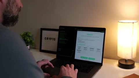 Middle Aged Hacker Minting Crypto Meme Coin Stockbeeldmateriaal 320645097