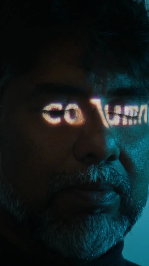 Middle Aged Indian Man with Computer Code Projected on Face Stock Footage 347316010