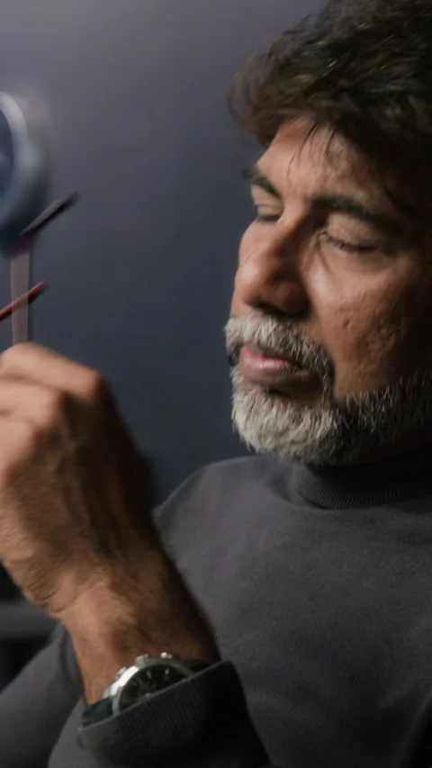 Middle Aged Indian Man Taking off Glasses from Eye Strain in Office Stock Footage 347314919
