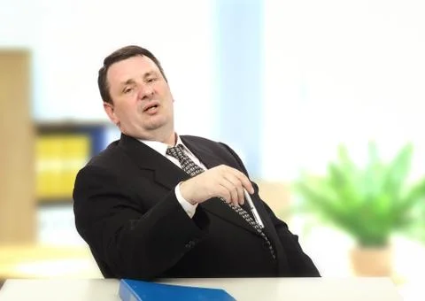 Middle-aged interviewer showing off Фото