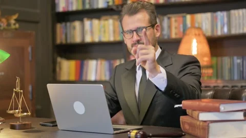 Middle Aged Lawyer Pointing at Camera with Laptop Stock Footage 294294794