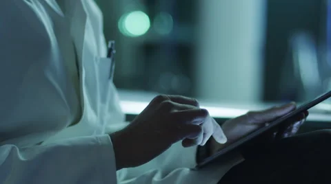 Middle Aged Male Scientist using Tablet in Laboratory Stock Footage 48407090