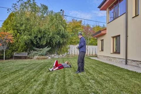 A middle-aged man and his wife work in the garden and do various maintenanc.. Stock Photos