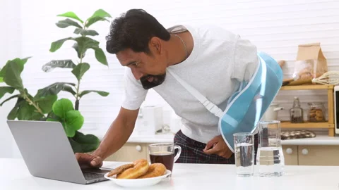 Middle-aged man with arm broken accident talk to insurance agent for compen.. Stock Footage 254748125