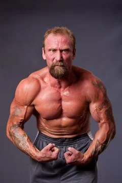 Middle aged man body builder Stock Photos