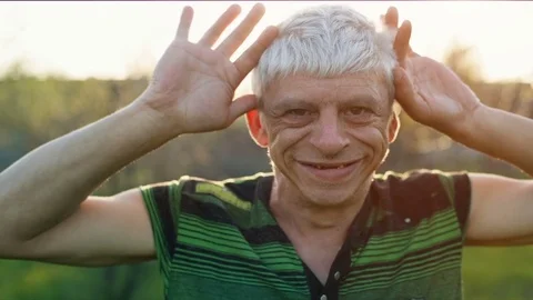 Middle aged man like a child 스톡 동영상 75240313