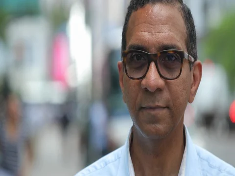 Middle aged man in city face portrait serious angry Stock Footage 75773721