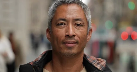Middle aged man in city face portrait smiling happy Stock Footage 120546779