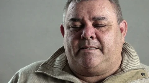 Middle aged man closeup portrait: looking at camera with tranquil and confident Stock Footage 72404683