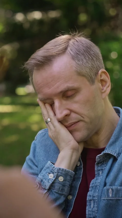 Middle Aged Man Crying during Outdoor Psychotherapy Session Stock Footage 344939586
