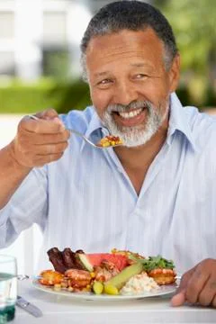 Middle Aged Man Dining Al Fresco Stock Photos