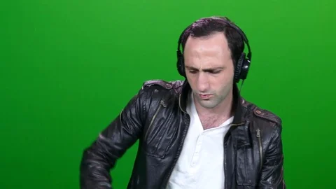 Middle Aged Man DJing on Green Screen 動画素材 83735822