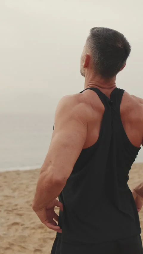 Middle-aged man doing exercising outdoors Stockbeeldmateriaal 237318444