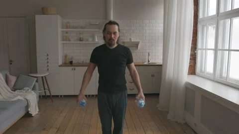 Middle Aged Man Doing Home Fitness No Equipment Exercises Stock Footage 150673934