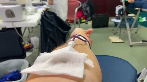 Middle-Aged Man Donating blood Stock Footage 233935291