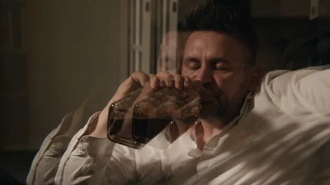 Middle Aged Man Drinking Alcohol from Bottle Suffering from Alcoholism Stock Footage 344868038