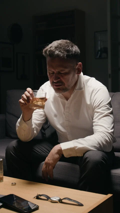 Middle Aged Man Drinking Alcohol with Wedding Ring in Despair Stock Footage 344870704