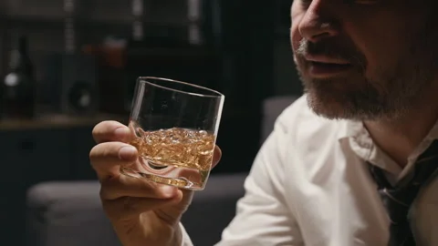 Middle Aged Man Drinking Whiskey Suffering from Alcohol Addiction Stock Footage 344854291