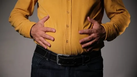 Middle-Aged Man with Excess Belly Fat Stock Footage 318239253