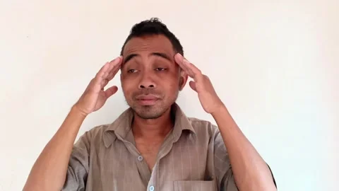 Middle-aged man experiencing stress and mental fatigue. Stock Footage 321940828