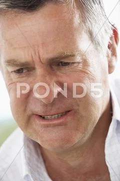 Middle Aged Man Frowning Stock Photos