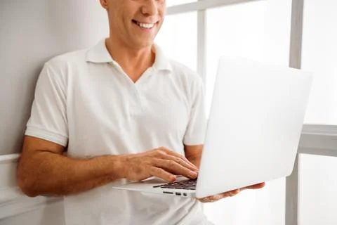 Middle aged man with gadget Stock Photos