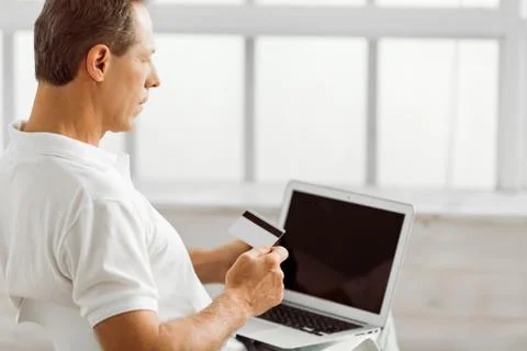 Middle aged man with gadget Stock Photos