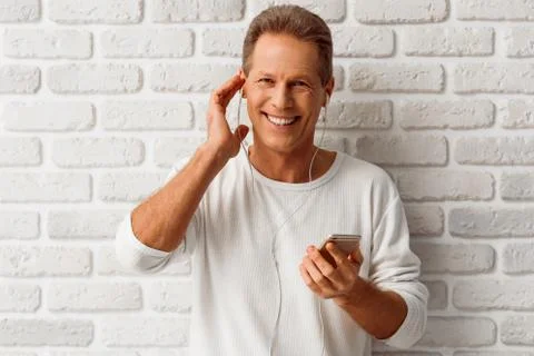 Middle aged man with gadget Foto stock