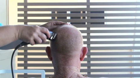 Middle Aged Man Gets Head Shave With Trimmer Stock-Footage 34495746