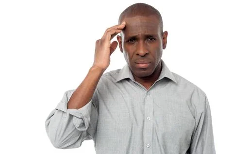 Middle aged man having headache Stock Photos