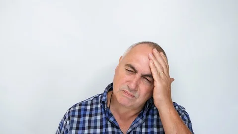 Middle aged man with headache isolated on white background Stock-Footage 115419417