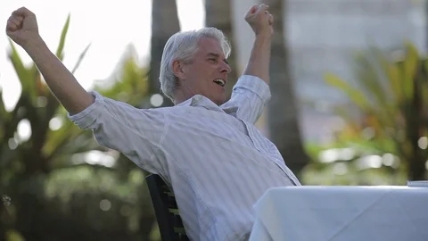 Middle-aged man with his hands behind his head. 스톡 동영상 88370116