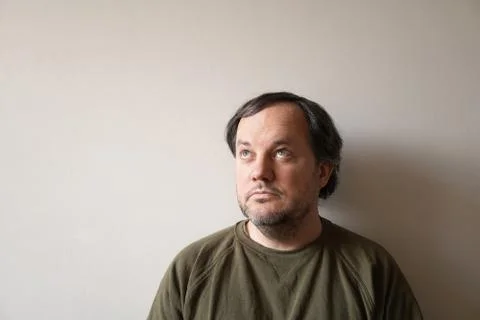 Middle aged man looking up Stock Photos