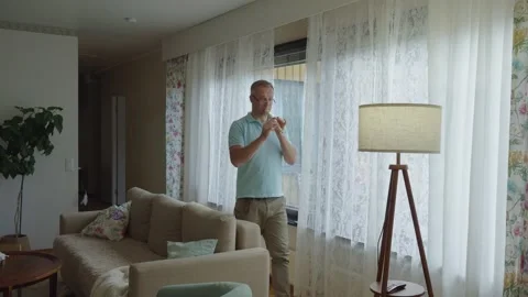 A middle-aged man playing recorder flute. Stock Footage 303782150