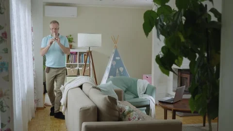 A middle-aged man playing recorder flute. Stock Footage 303782291