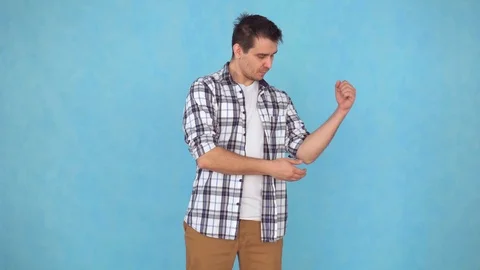 Middle-aged man problems and pain in the elbow joint 스톡 동영상 106780131