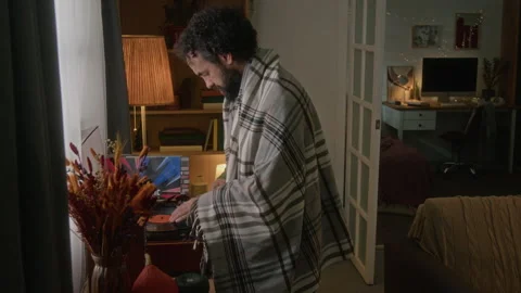 Middle Aged Man Putting Vinyl Record on Turntable at Home Stock Footage 341675429