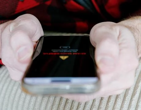 Middle Aged Man Recieves 2FA Intecept Scam Texts Stock Photos